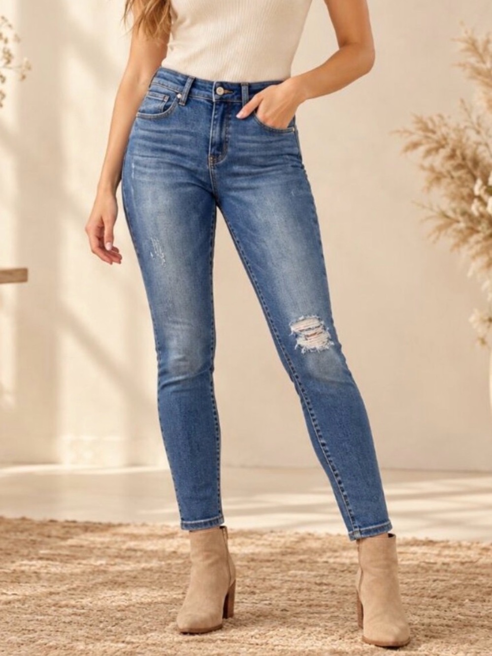 Altar’d State women’s distressed slim jeans in a classic medium blue wash, 31